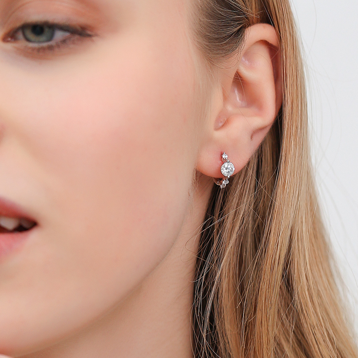 Clara Four-Stone Moissanite Hoop Earrings