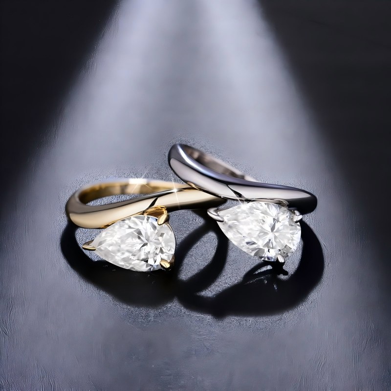Curved Pear Moissanite Ring