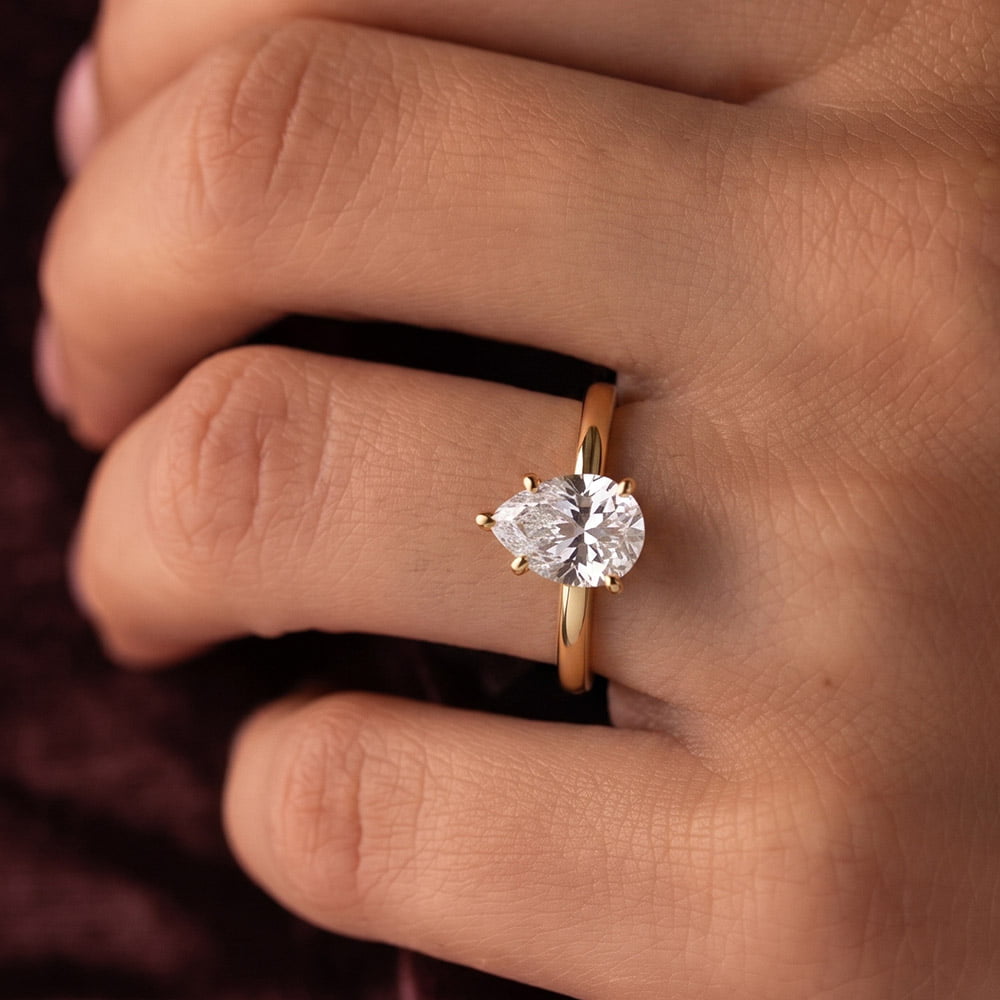 Classic Five-Prong Pear Moissanite Ring