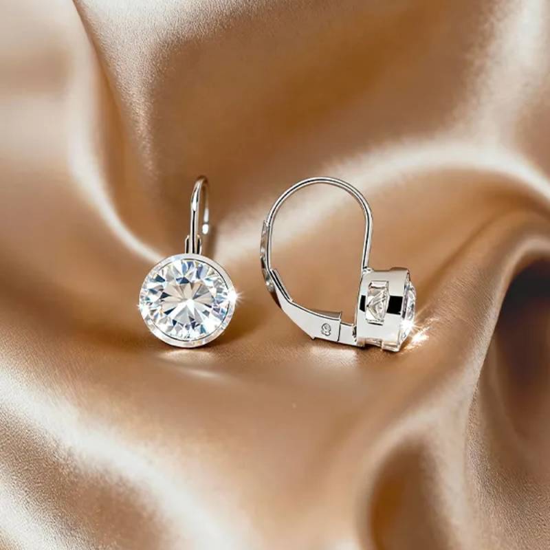 A professional minimalist presentation of modern bezel set moissanite jewelry - VOOGMECHIC bezel collection cover