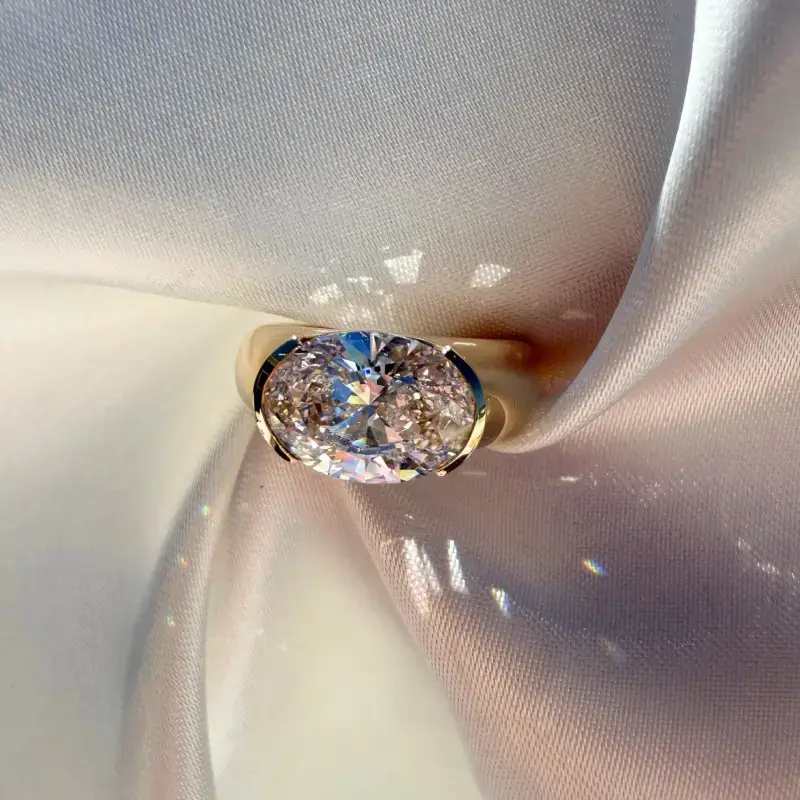 Half Bezel Oval Moissanite Engagement Ring