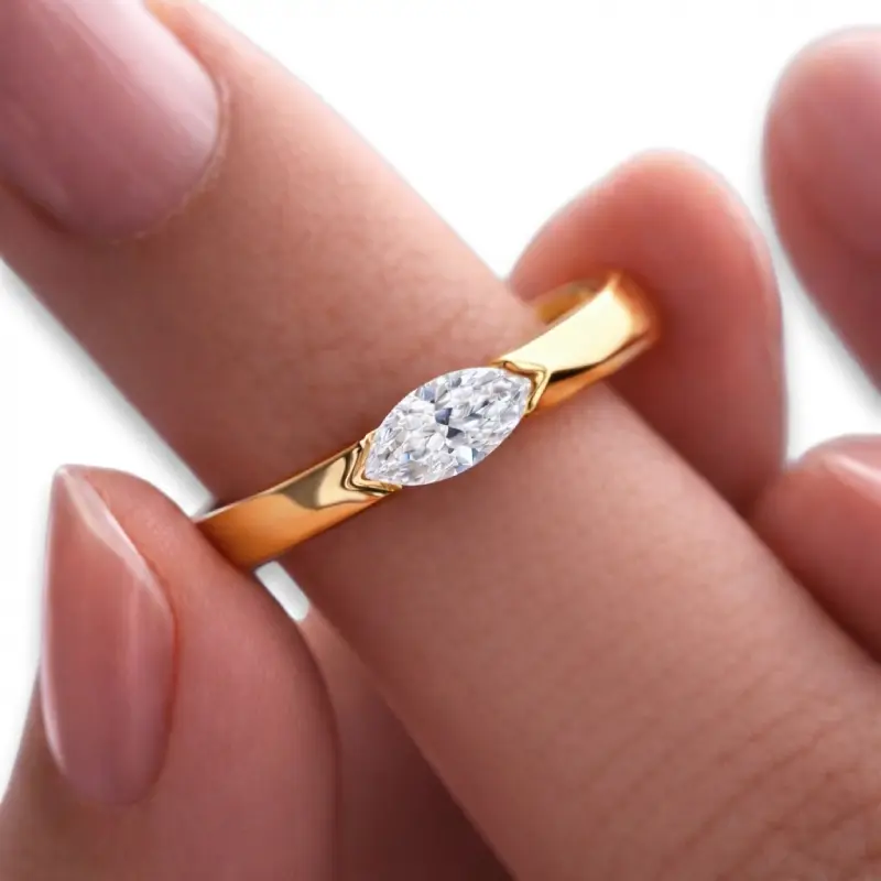 Half Bezel Marquise Moissanite Ring
