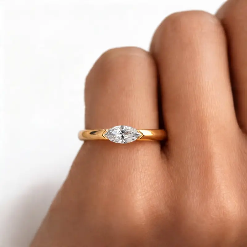 Half Bezel Marquise Moissanite Ring