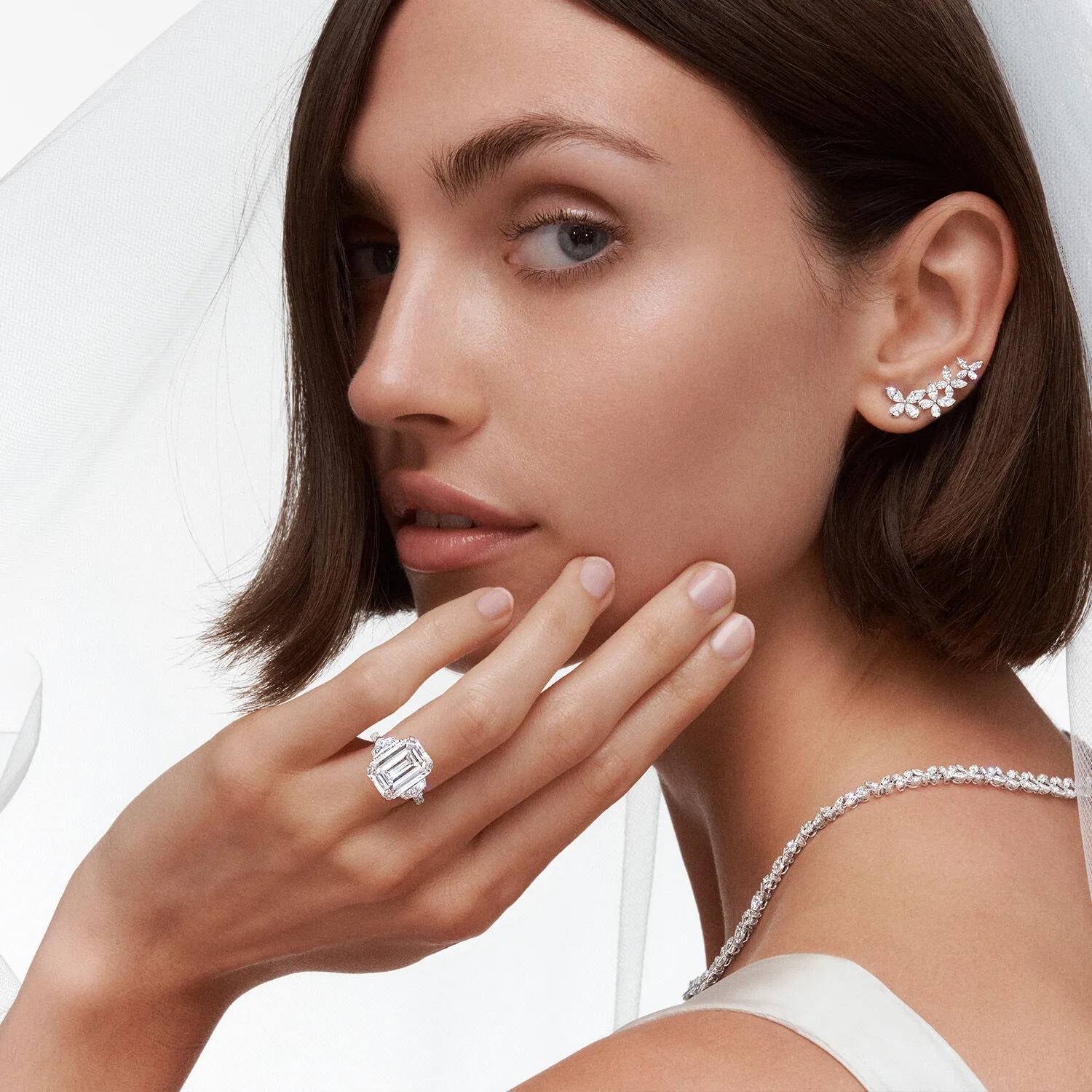 A premium display of moissanite engagement rings showcasing classic solitaire, luxury halo, and vintage bridal settings on velvet - VOOGMECHIC engagement rings category cover