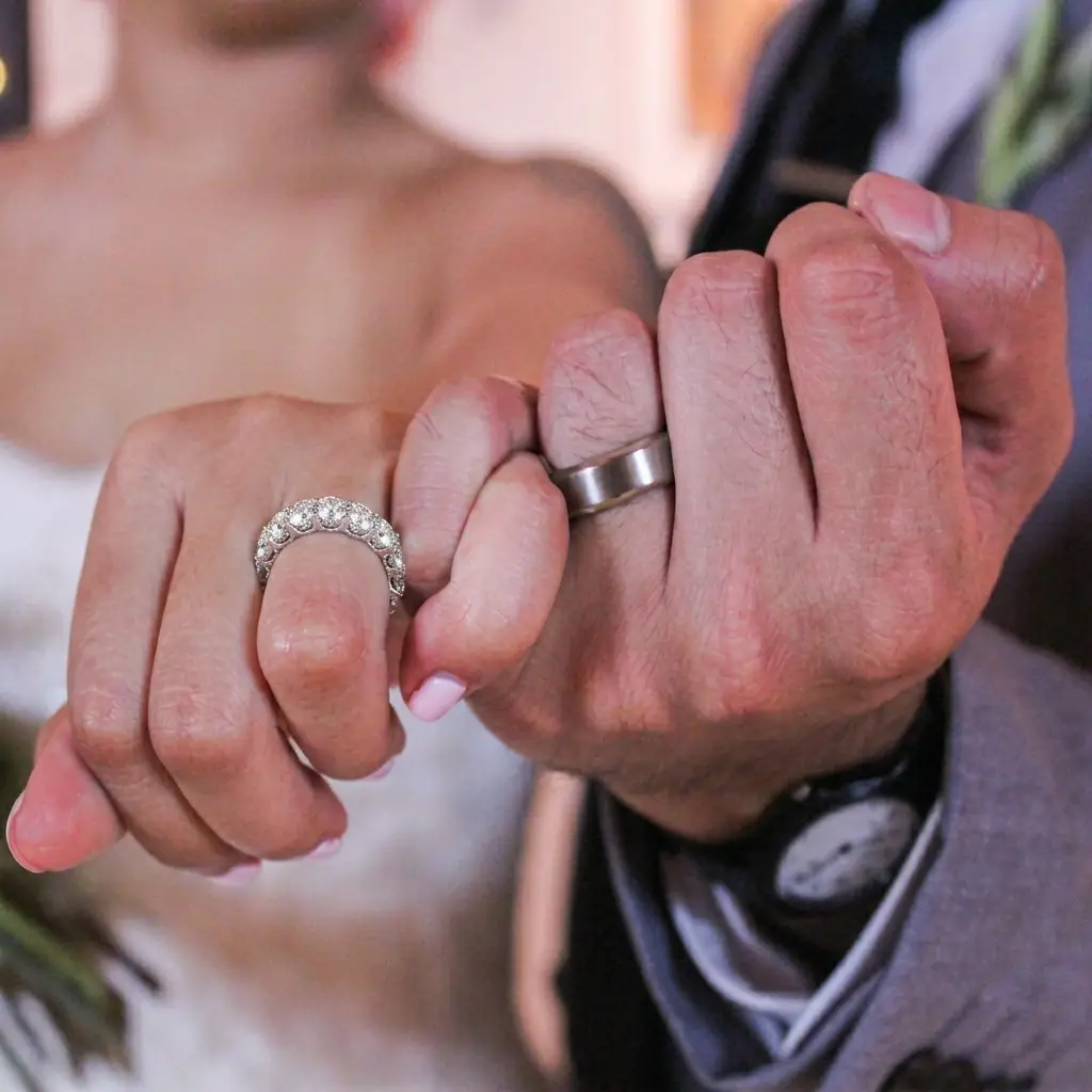 A luxury presentation of moissanite wedding bands showcasing premium eternity bands, five stone rings, matching bands and men's wedding rings in a velvet box - VOOGMECHIC wedding bands category cover