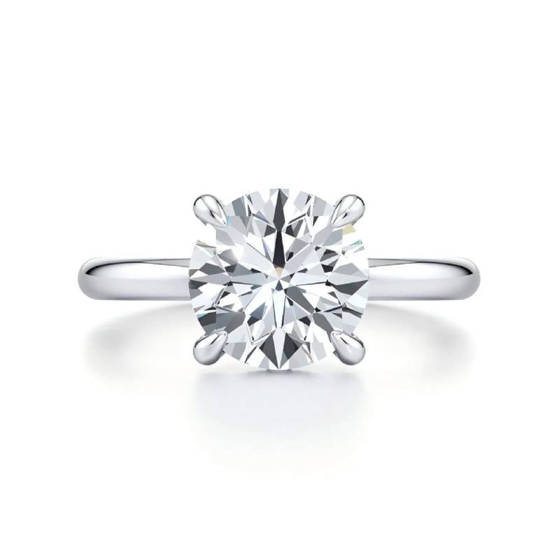 Classic Four-Prong Round Moissanite Ring