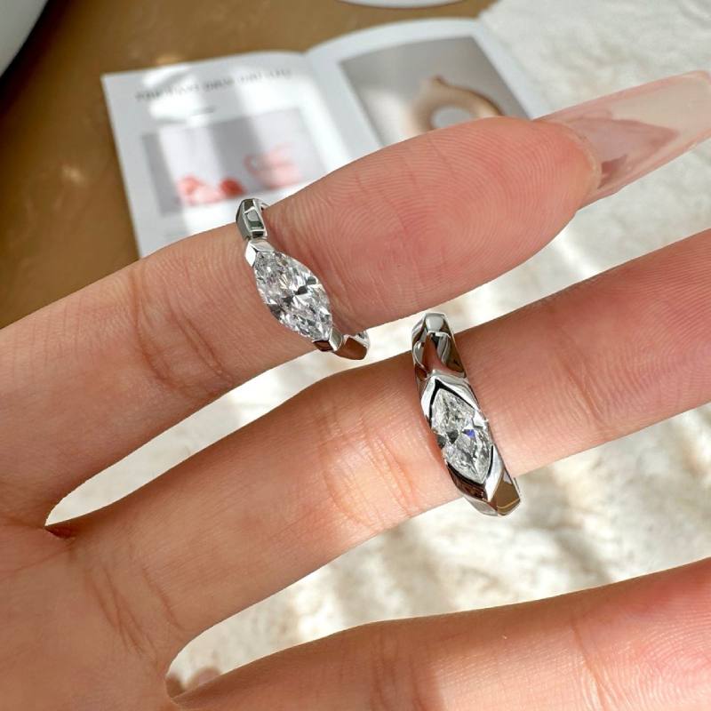 Half Bezel Marquise Moissanite Ring