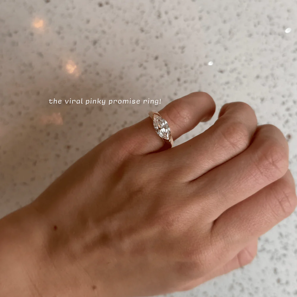 Half Bezel Marquise Moissanite Ring