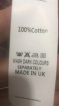 可能是包含下列内容的图片:上面的文字是“100%Cotto 1X0 WASH DARK COLOURS SEPARATELY MADE IN UK”