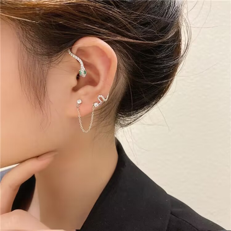 Diamond-studded snake-shaped earrings