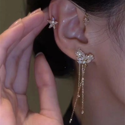 Star tassel earrings with diamonds