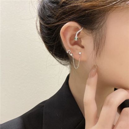 Diamond-studded snake-shaped earrings