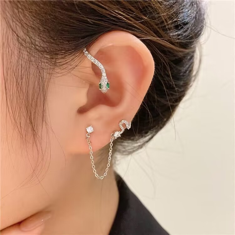 Diamond-studded snake-shaped earrings