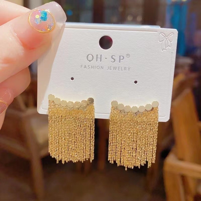 Arc-shaped tassel earrings