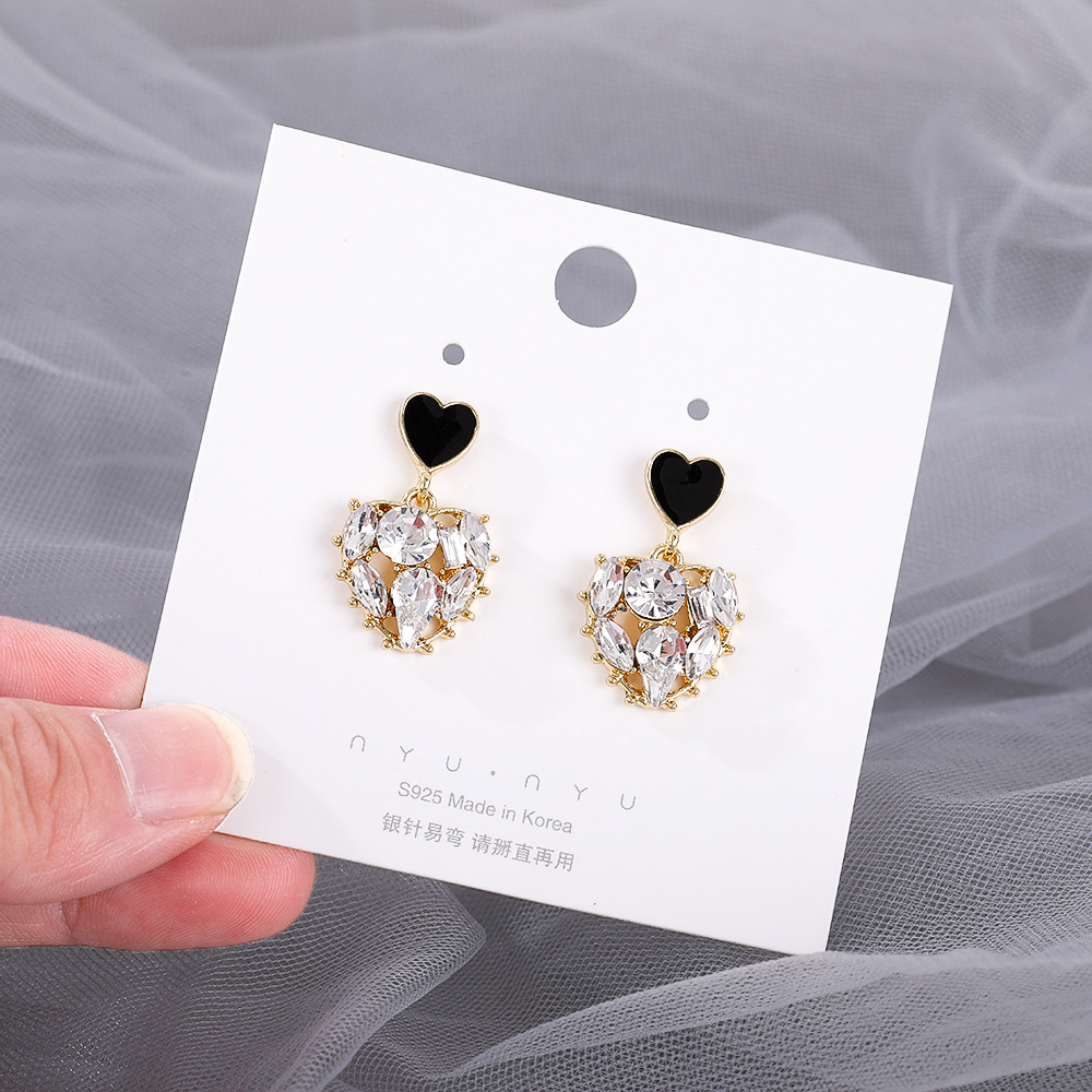 Star tassel earrings with diamonds