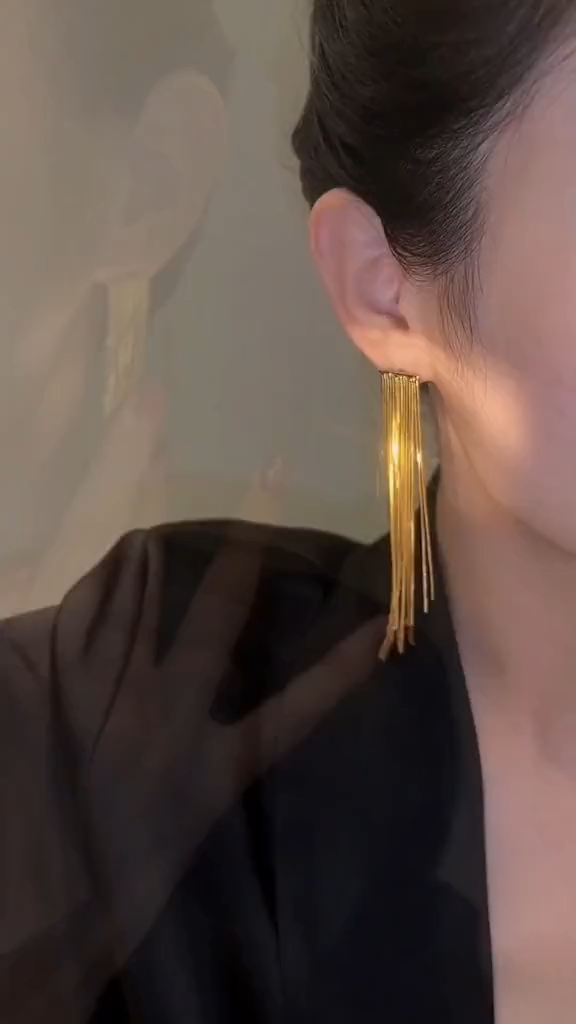 Star tassel earrings with diamonds