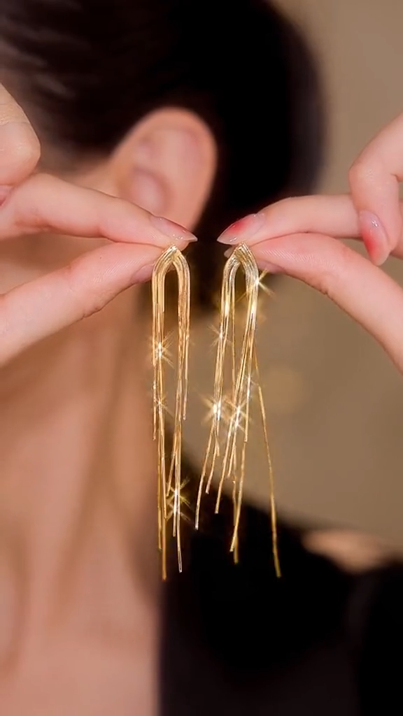Star tassel earrings with diamonds