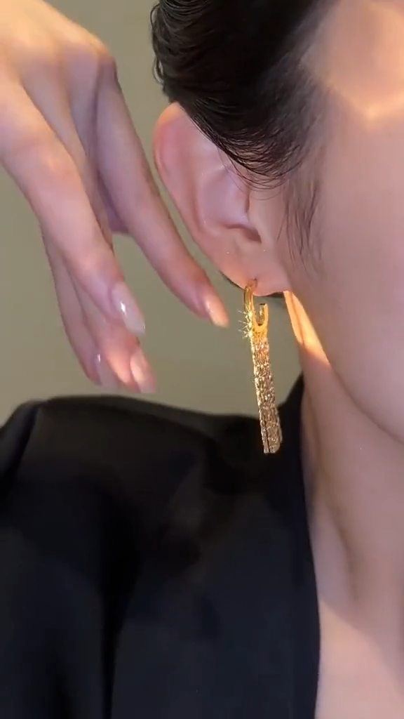 Star tassel earrings with diamonds