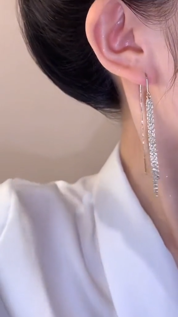 Star tassel earrings with diamonds