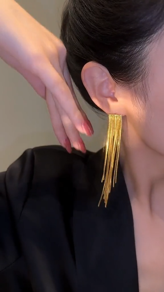 Star tassel earrings with diamonds