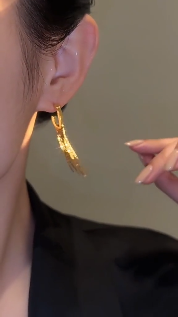 Star tassel earrings with diamonds