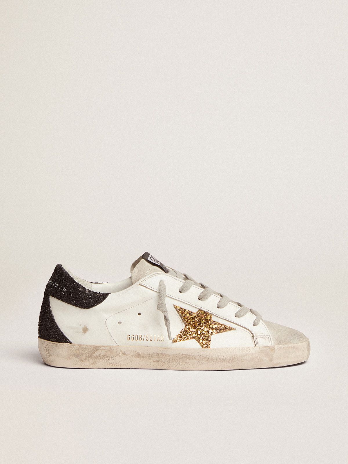 Sup-S sneakers with gold star and glittery black heel tab