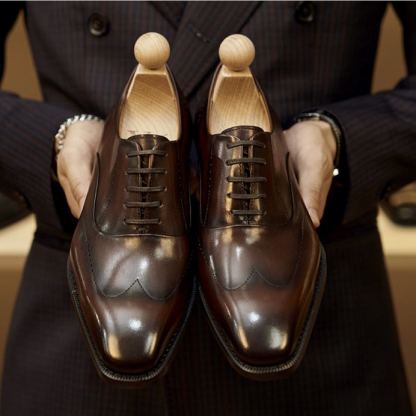 Comfortable and breathable round-toe lace-up men's shoes, made of high-quality cowhide leather.
