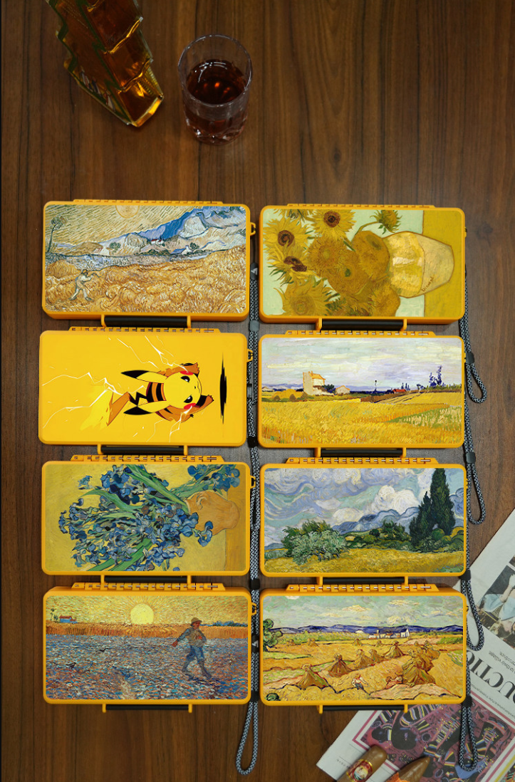 Collection of custom printed ultra-thin travel cigar cases displayed on a table