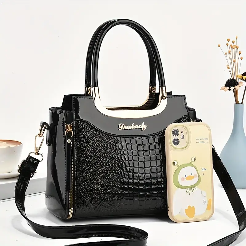 Elegante bolso de mano de piel de cocodrilo texturizada