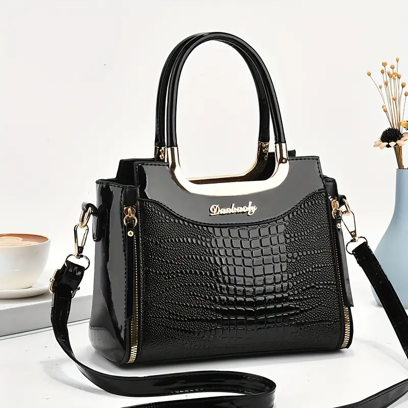 Elegante bolso de mano de piel de cocodrilo texturizada