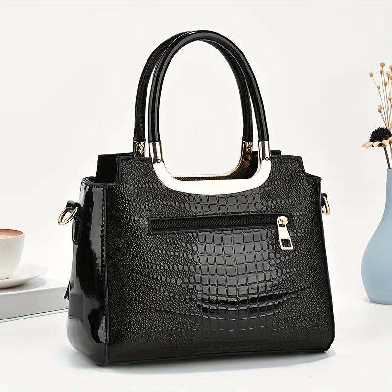 Elegante bolso de mano de piel de cocodrilo texturizada