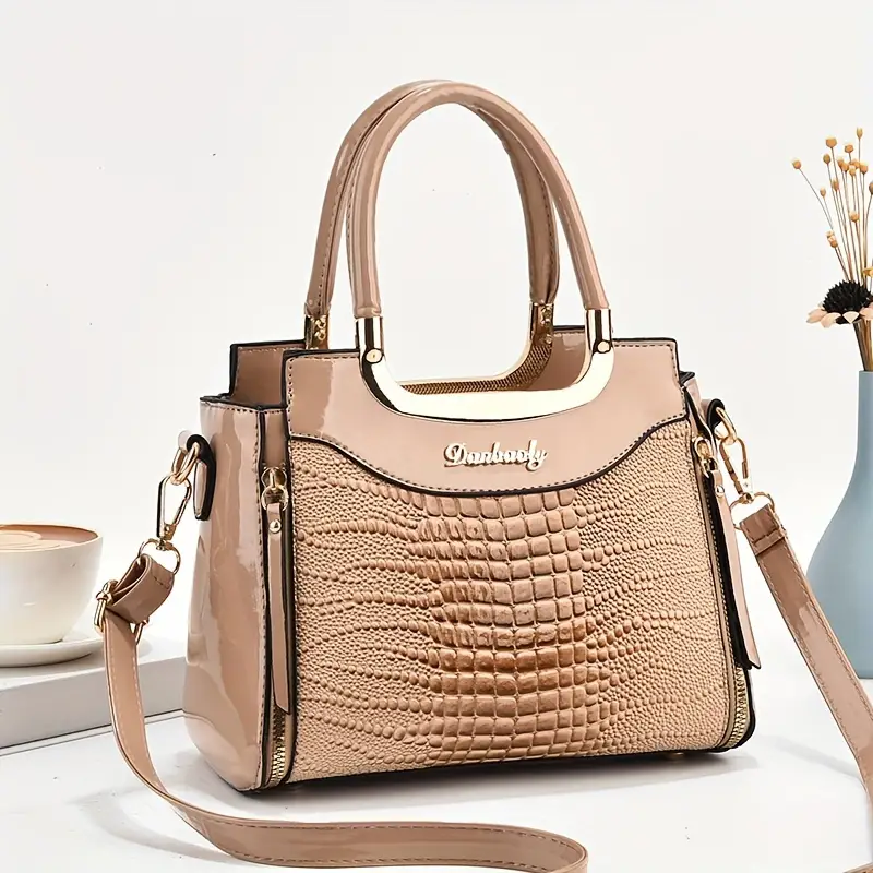 Elegante bolso de mano de piel de cocodrilo texturizada