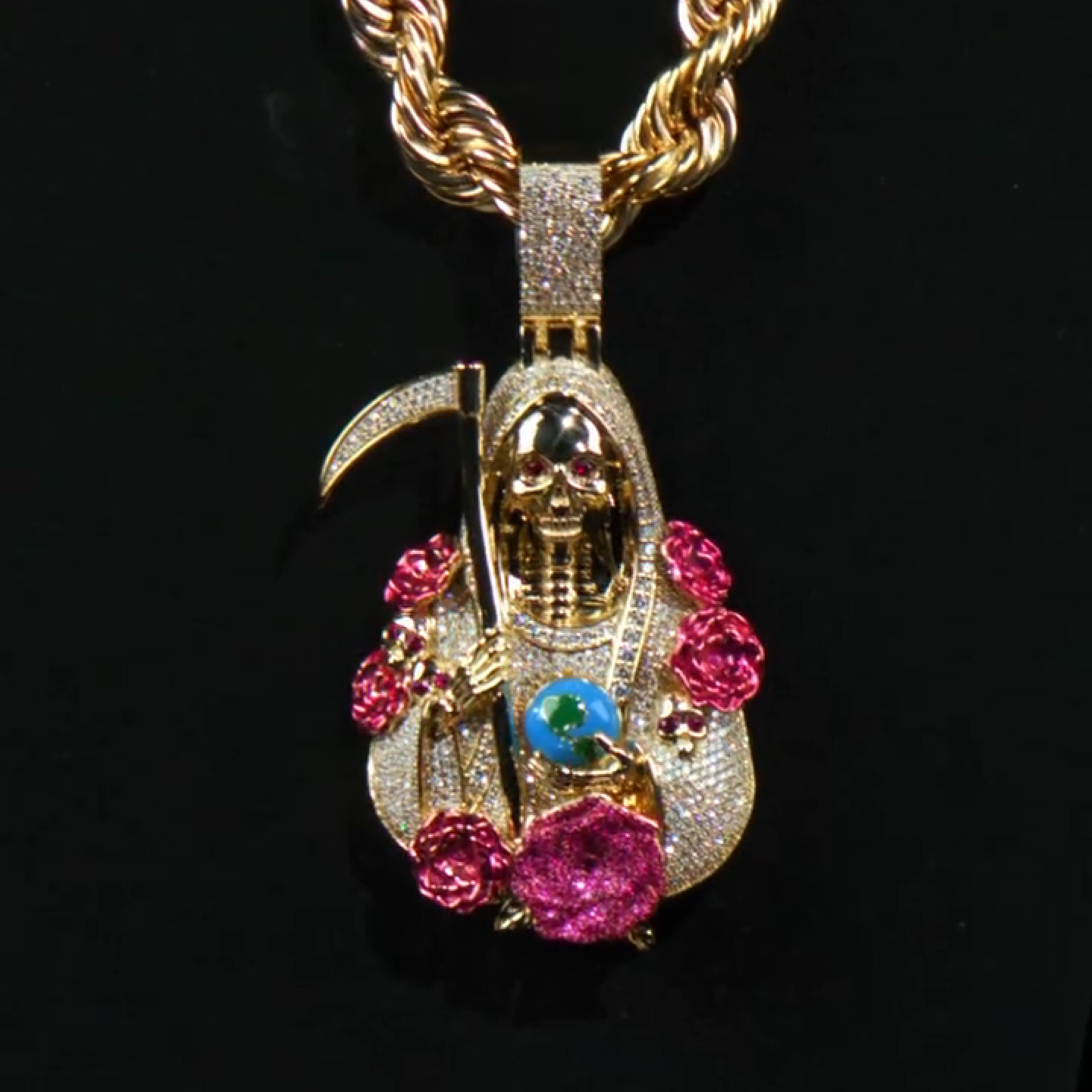 Man wearing Santa Muerte Serenity pendant hip hop jewelry
