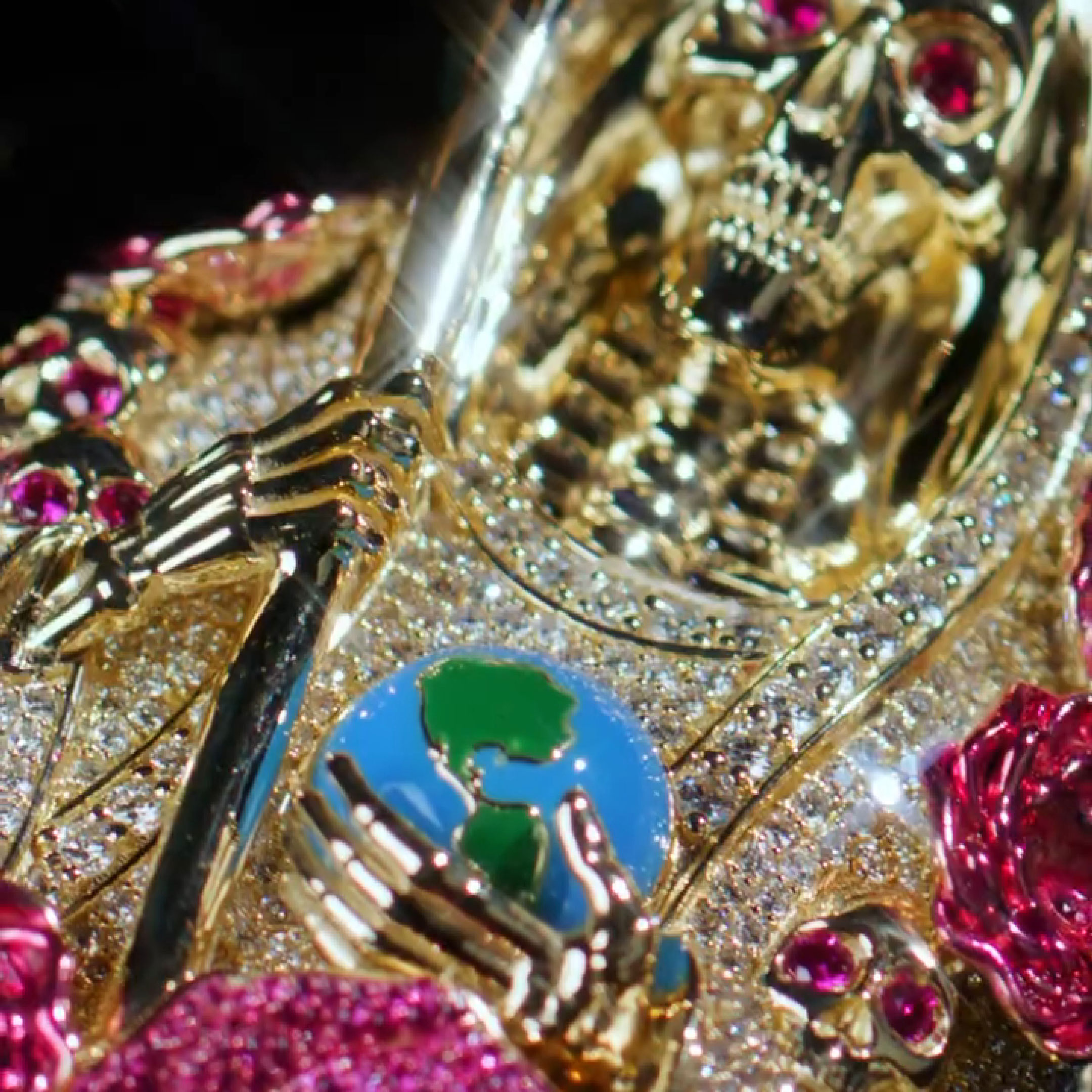 Close-up of moissanite stones on Santa Muerte Serenity pendant
