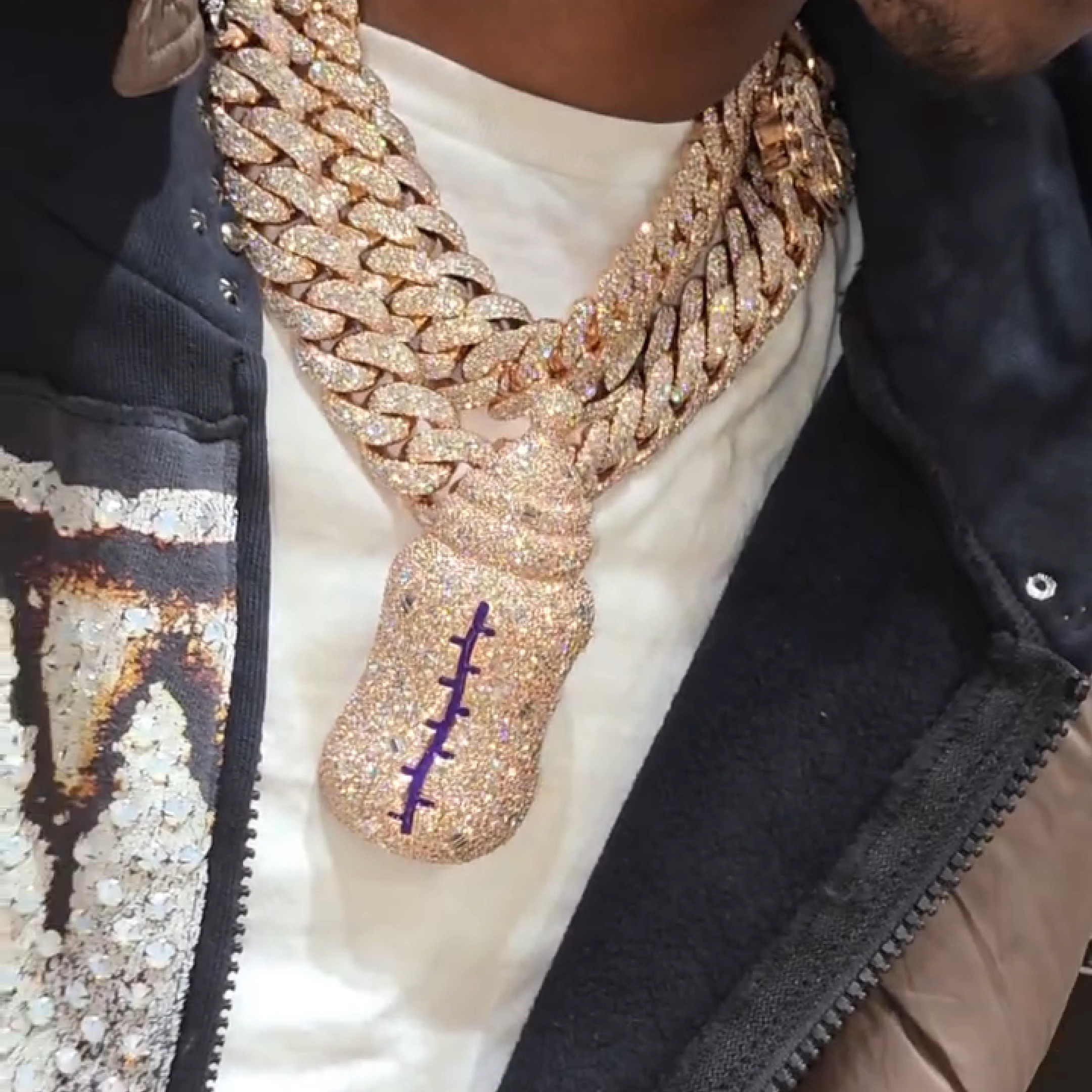 Model wearing New Bottle pendant emerald gemstone necklace