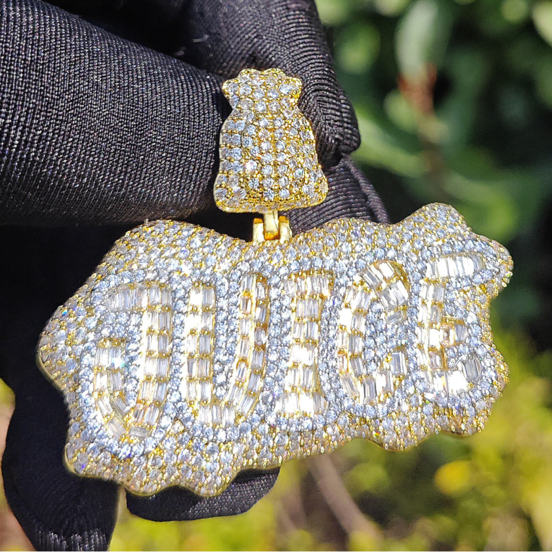 white gold and gold JUICE letter pendant luxury statement jewelry display