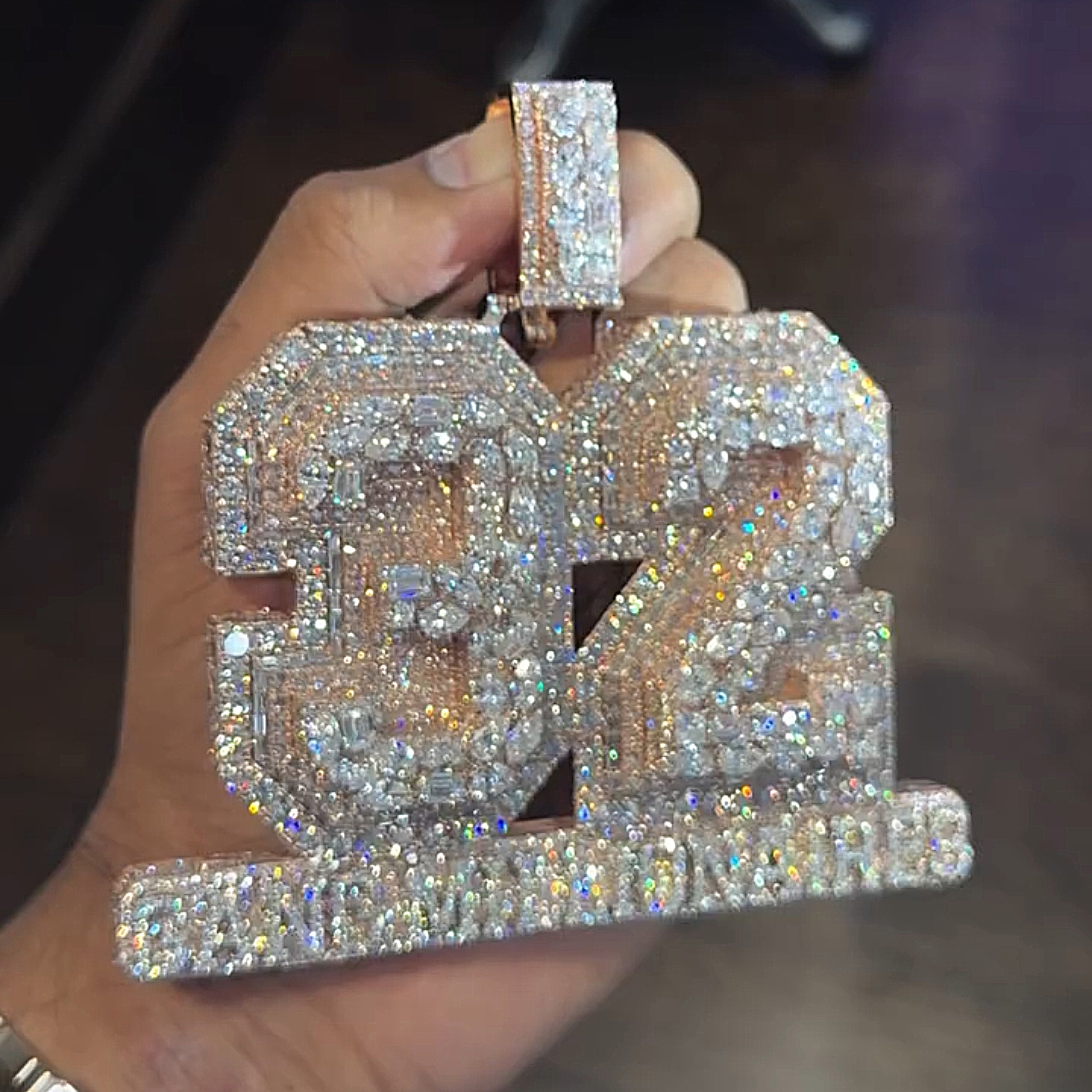 rose gold 32 pendant with GANG MILLIONAIRES lettering front view hip hop jewelry