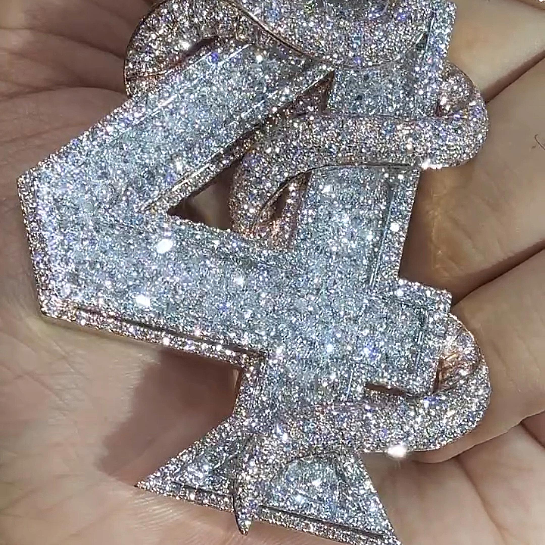PROFIT coiled viper pendant close up stone detailing premium craftsmanship jewelry