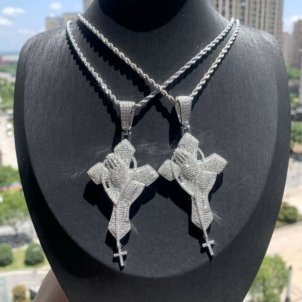praying hands cross pendant angled view stone detailing luxury finish jewelry