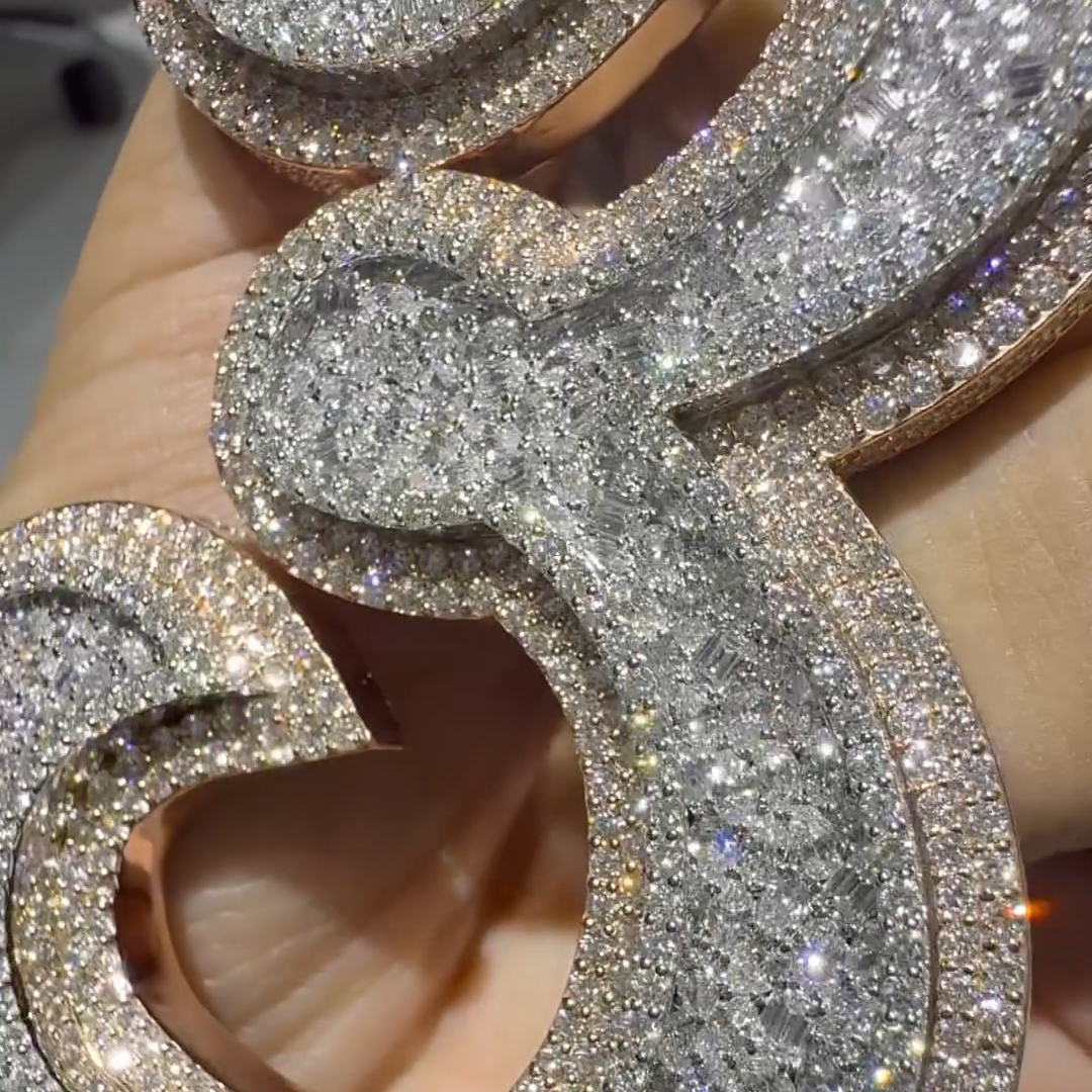 Side view of number 3 moissanite hip hop pendant with iced setting
