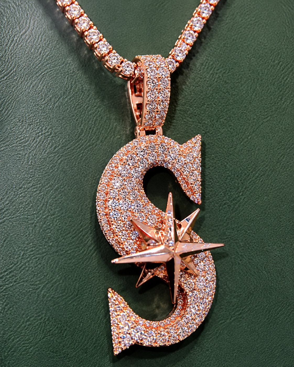 Iced out rose gold S pendant with star compass centerpiece and CZ stones