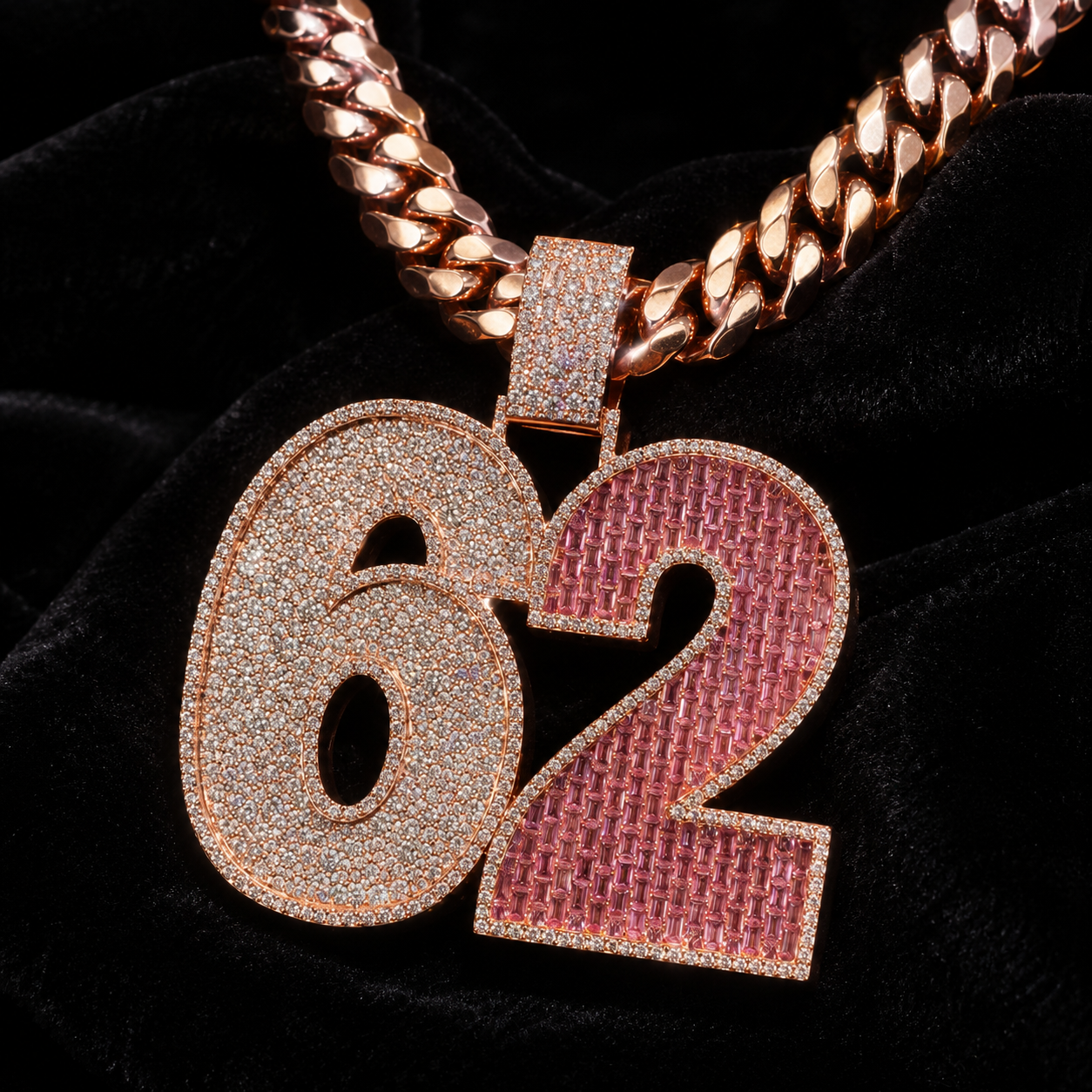 Sparkling Number 62 hip hop pendant with clear stones and pink baguette-style detail.