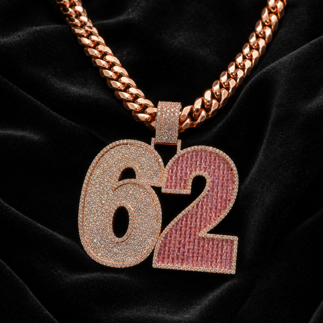Black velvet product photo of rose gold iced out 62 pendant