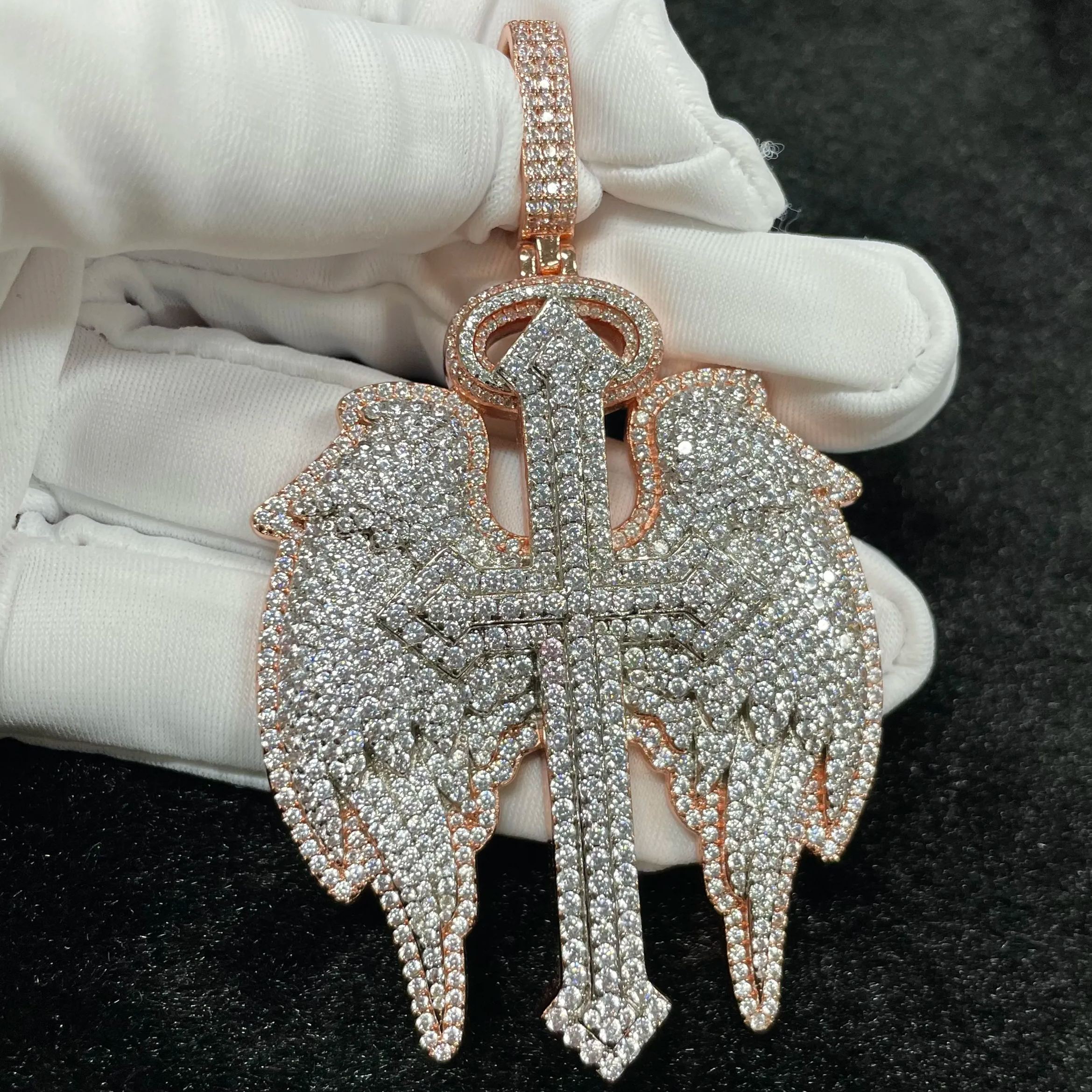 Angel wings cross pendant with premium CZ stones and rapper jewelry aesthetic