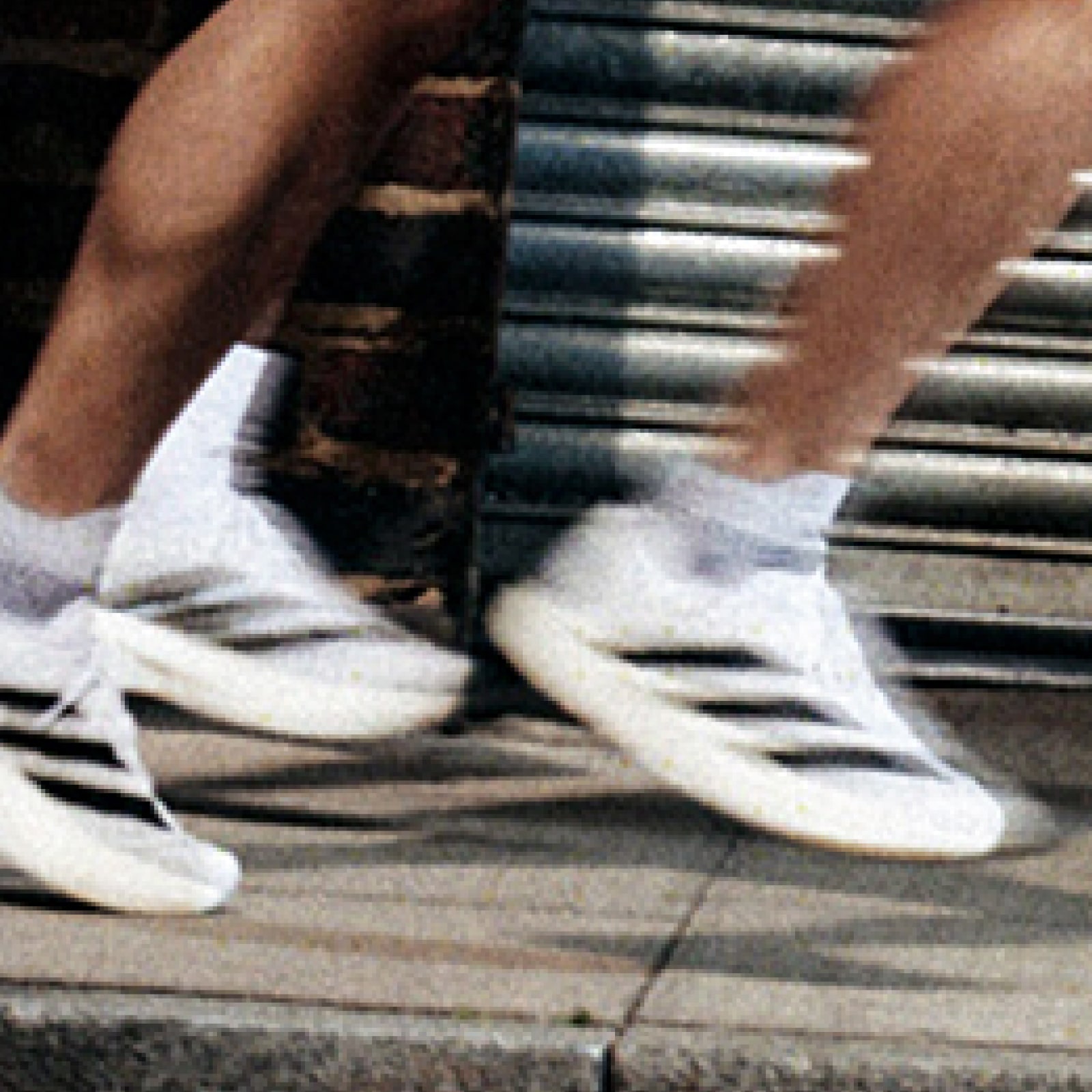 Closeup image of running in action of the Evo SL shoe.