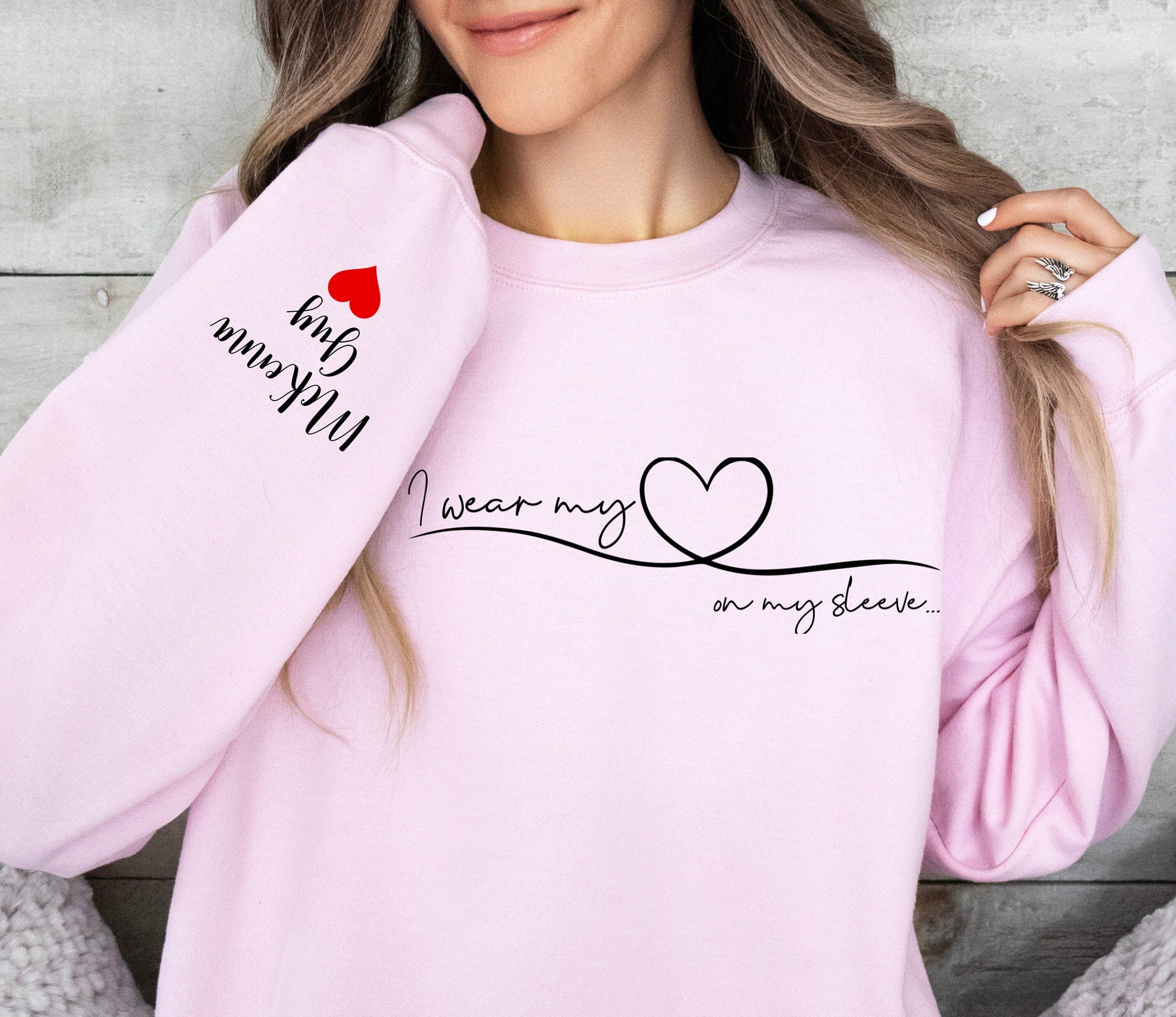I Wear My Heart On My Sleeve Sweatshirt With Kid Names, Custom Mom Sweatshirt, Kids Names On Sleeve-ilovevango