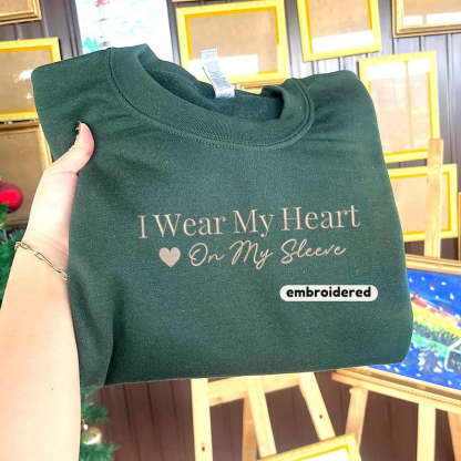 Embroidered I Wear My Heart On My Sleeve Sweatshirt, Custom Mama Sweatshirt with Kids Name on Sleeve, Christmas Mother Day Gift for Mom-ilovevango