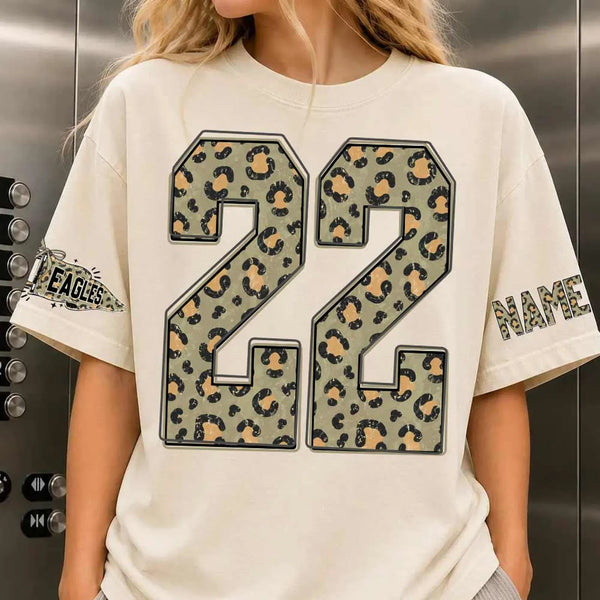 Custom Leopard Team Tee with Personalized Initial, Number & Sleeve Print — Your Go-To Game Day Shirt.