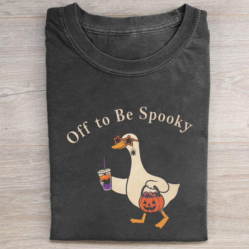 Off To Be Spooky Goose Holding Coffee Pumpkin Bucket Folded Washed T-shirt