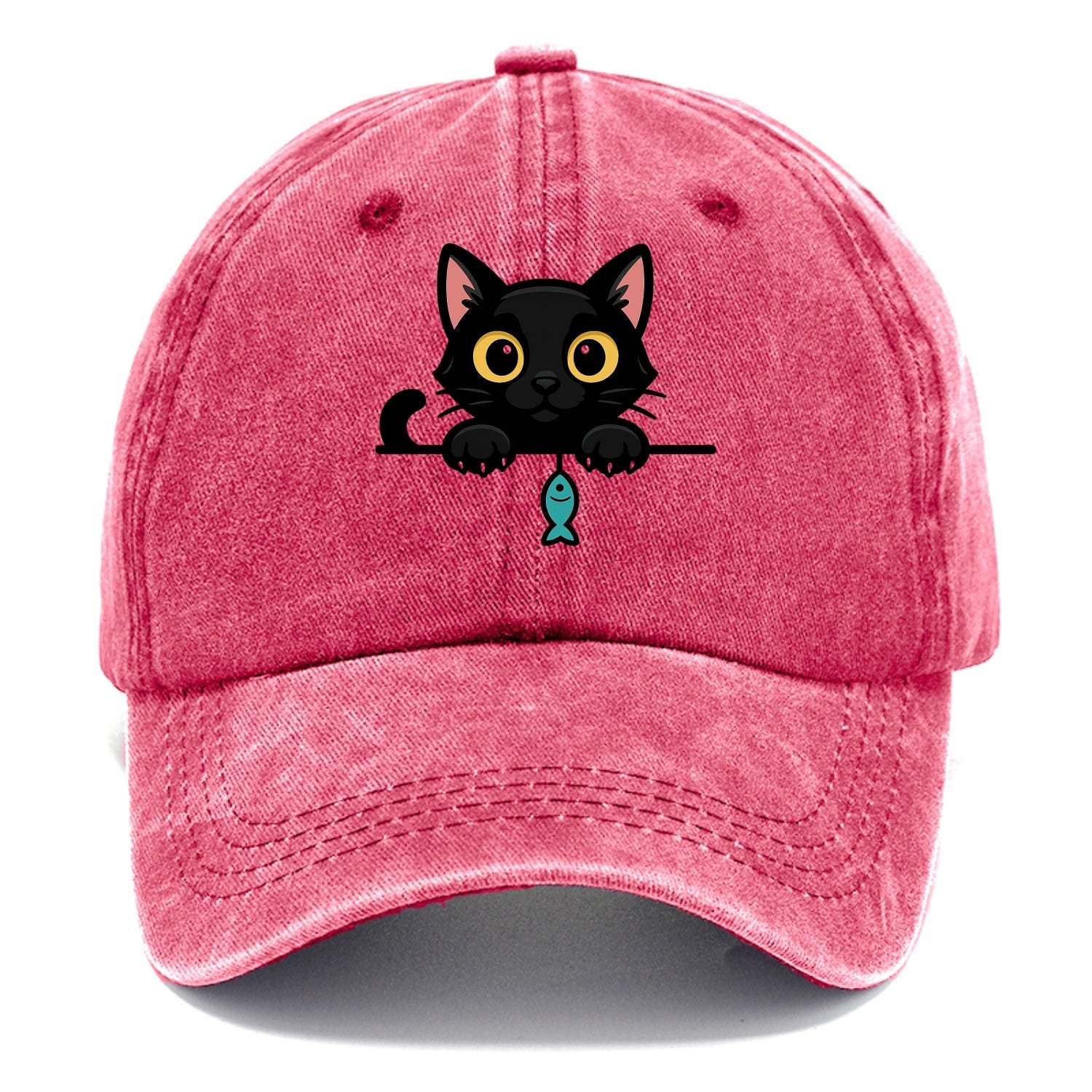 Midnight the black cat holding a tiny yarn ball between both paws while peeking Washed Cap